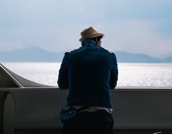 Person looking towards the horizon while planning for retirement