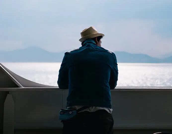 Person looking towards the horizon while planning for retirement